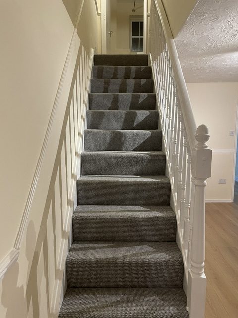 Staircase after wall repairs, painting, new carpet and refurbished woodwork - Nix Fix Handiman